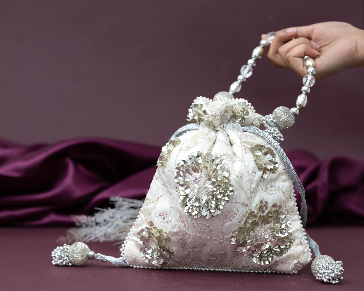 Elegant Ivory Silk Potli Bag with Floral Sequin Embroidery - Image 2