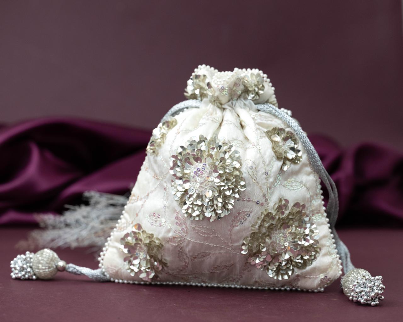 Elegant Ivory Silk Potli Bag with Floral Sequin Embroidery