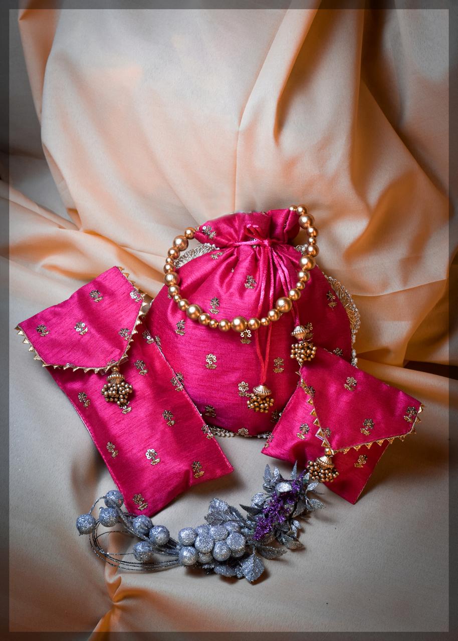 Pink Silk Potli Bag Set with Pearl Handle and Gold Zari Buti Work