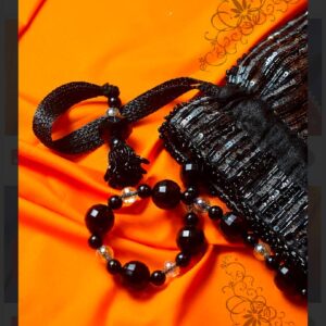 Satin Potli Bag with Chevron Sequin Embellishment and Beaded Handle