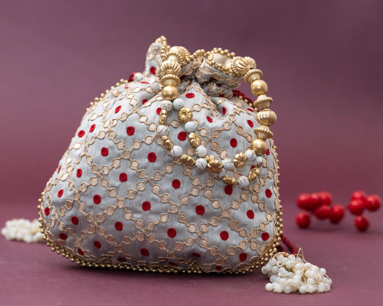 Silver Silk Potli Bag with Gold Embroidery and Red Polka Dots