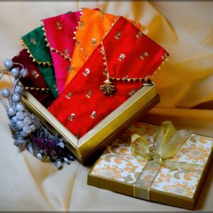 Assorted Silk Potli Bags with Sequin Floral Motifs and Gold Tassels