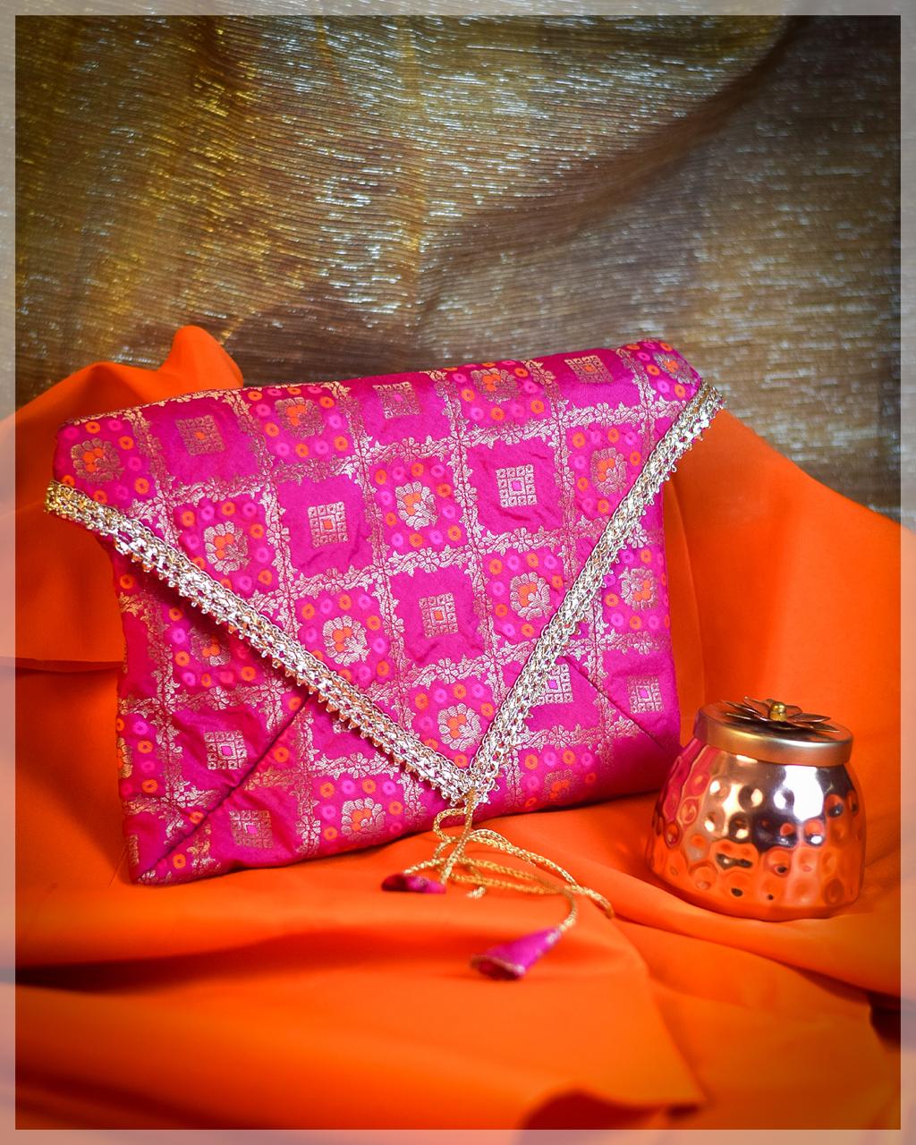 Orange Silk Potli Bag and Envelope Pouch Set with Gold Floral Embroidery - Image 2