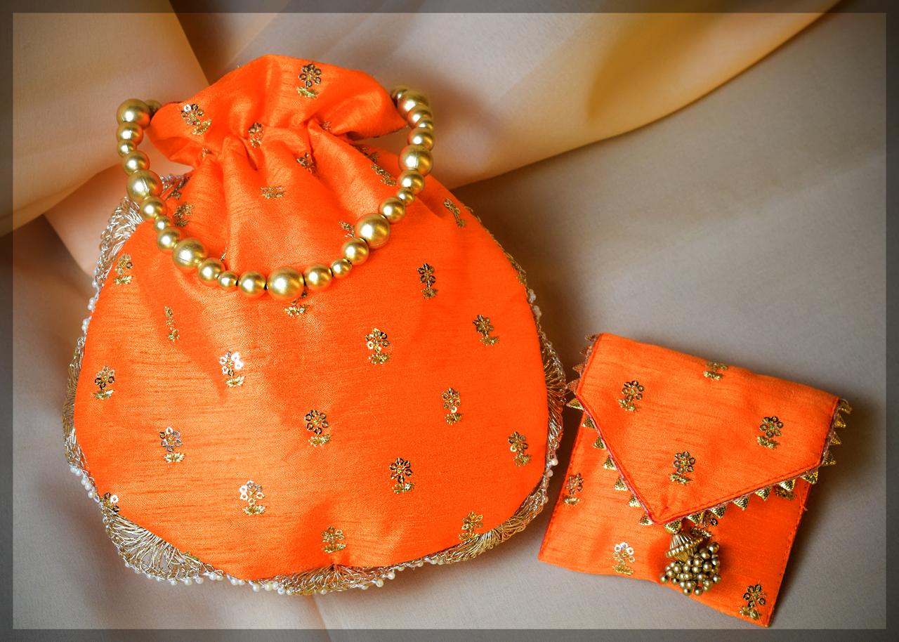 Orange Silk Potli Bag and Envelope Pouch Set with Gold Floral Embroidery