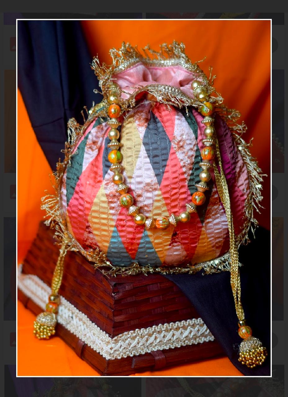 Pink Multicolor Silk Potli Bag with Beaded Handle and Tassel Latkans